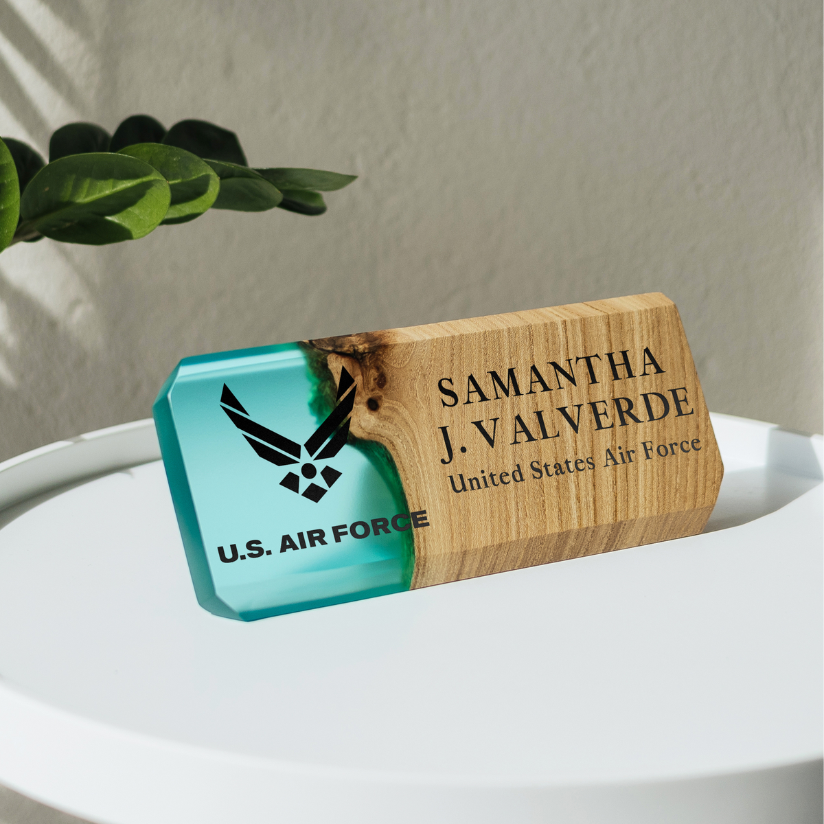 Custom desk name plate engraved with a name, title and U.S. Air Force emblem in aqua blue epoxy and elm