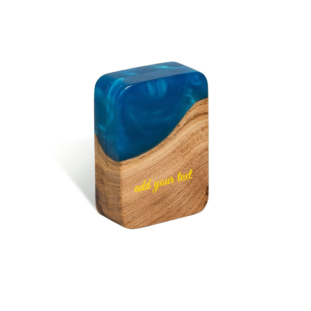 Closed FLIP proposal ring box in blue epoxy and elm wood with a gold 'add your text' engraving placeholder