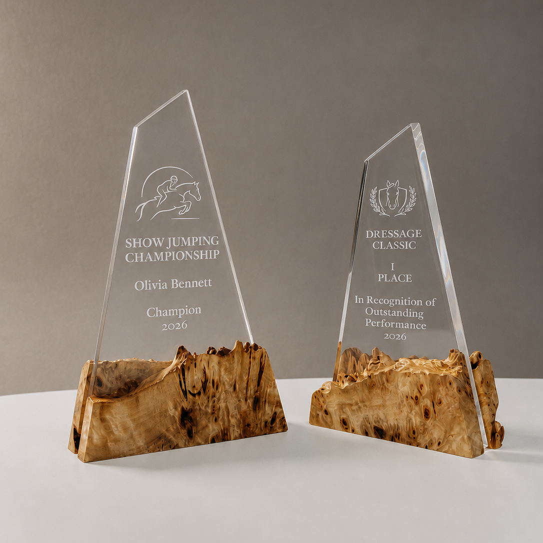 Two clear epoxy and elm wood award plaques engraved for a show jumping and a dressage competition