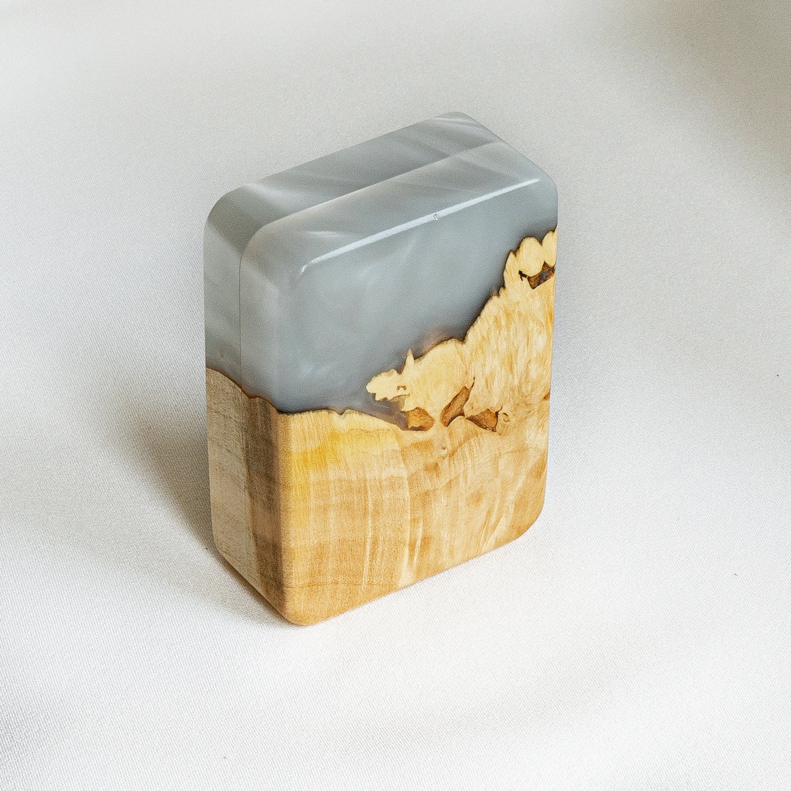 Closed engagement ring box crafted from platinum epoxy and natural maple wood, FLIP collection