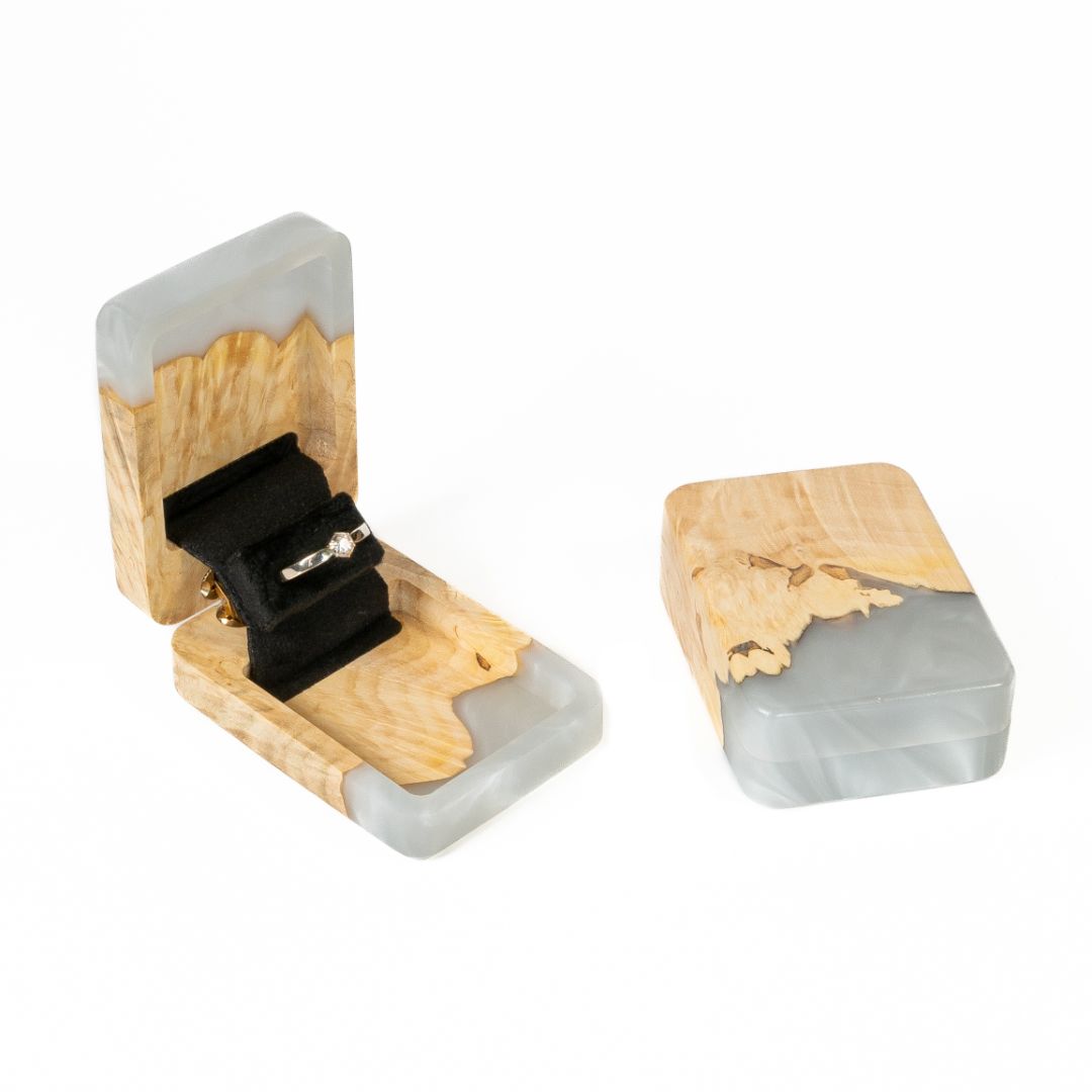 Open and closed platinum epoxy and maple wood engagement ring box displayed together