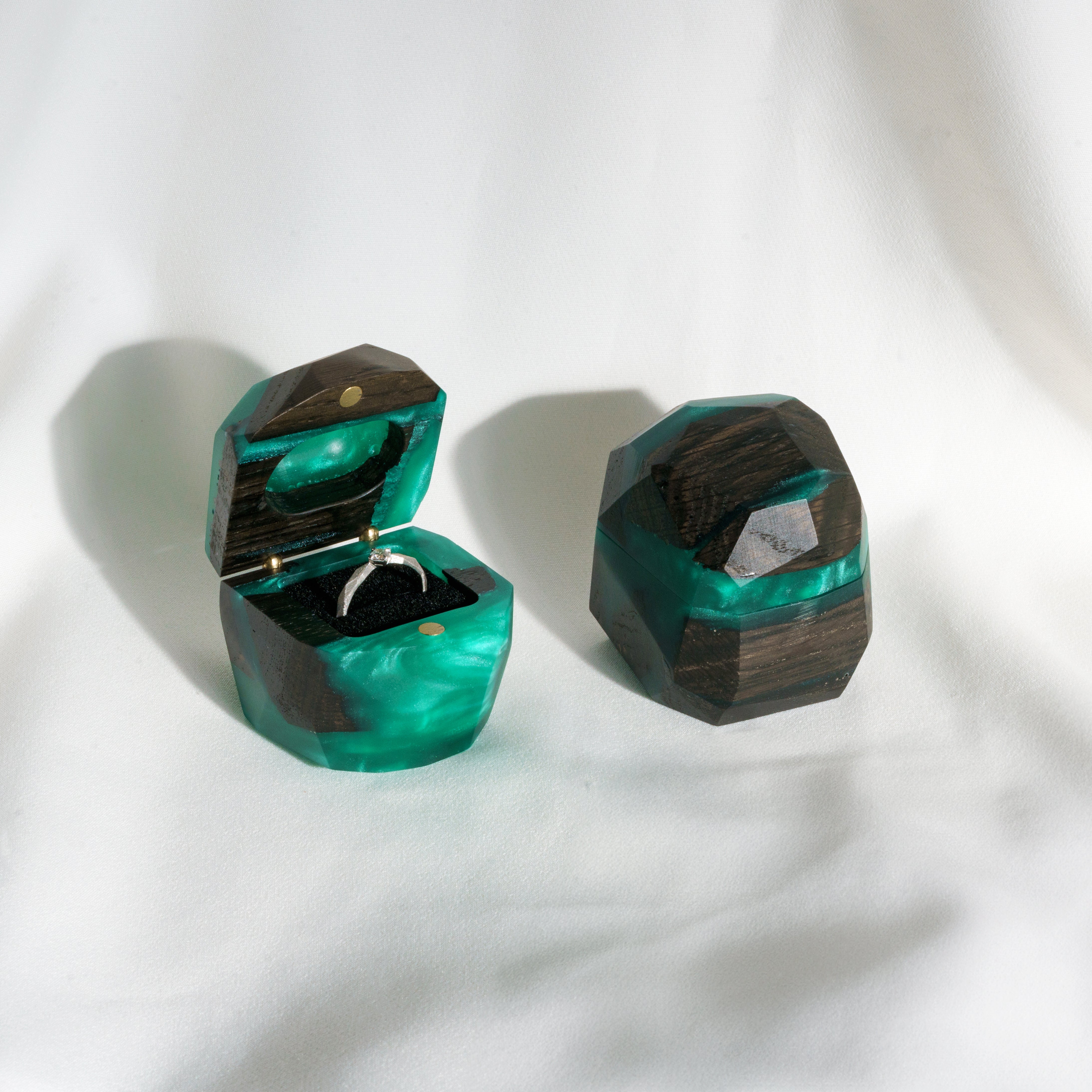 Open engagement ring box handcrafted from green epoxy and bog oak wood with matching closed lid, METEORITE design