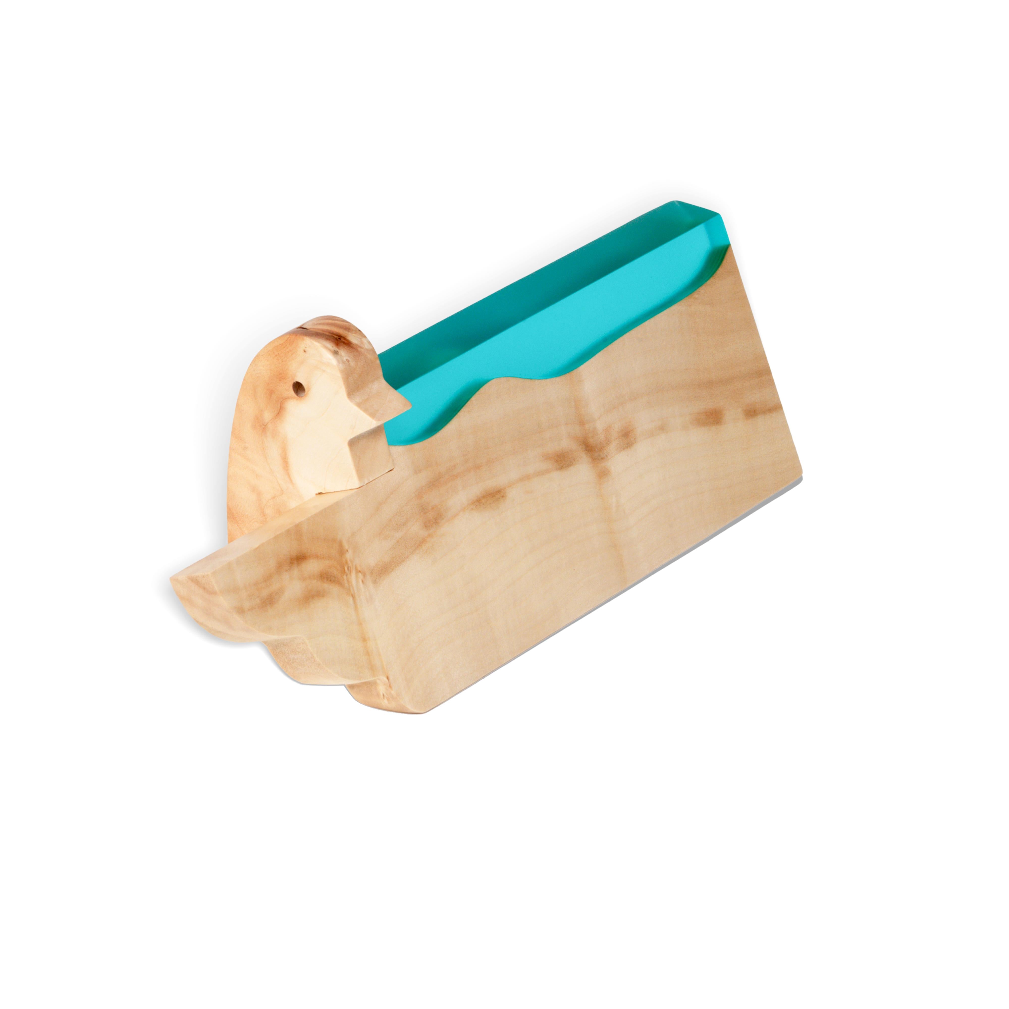 Profile view of the personalized BIRDY desk name plate made from maple wood and aqua blue epoxy resin
