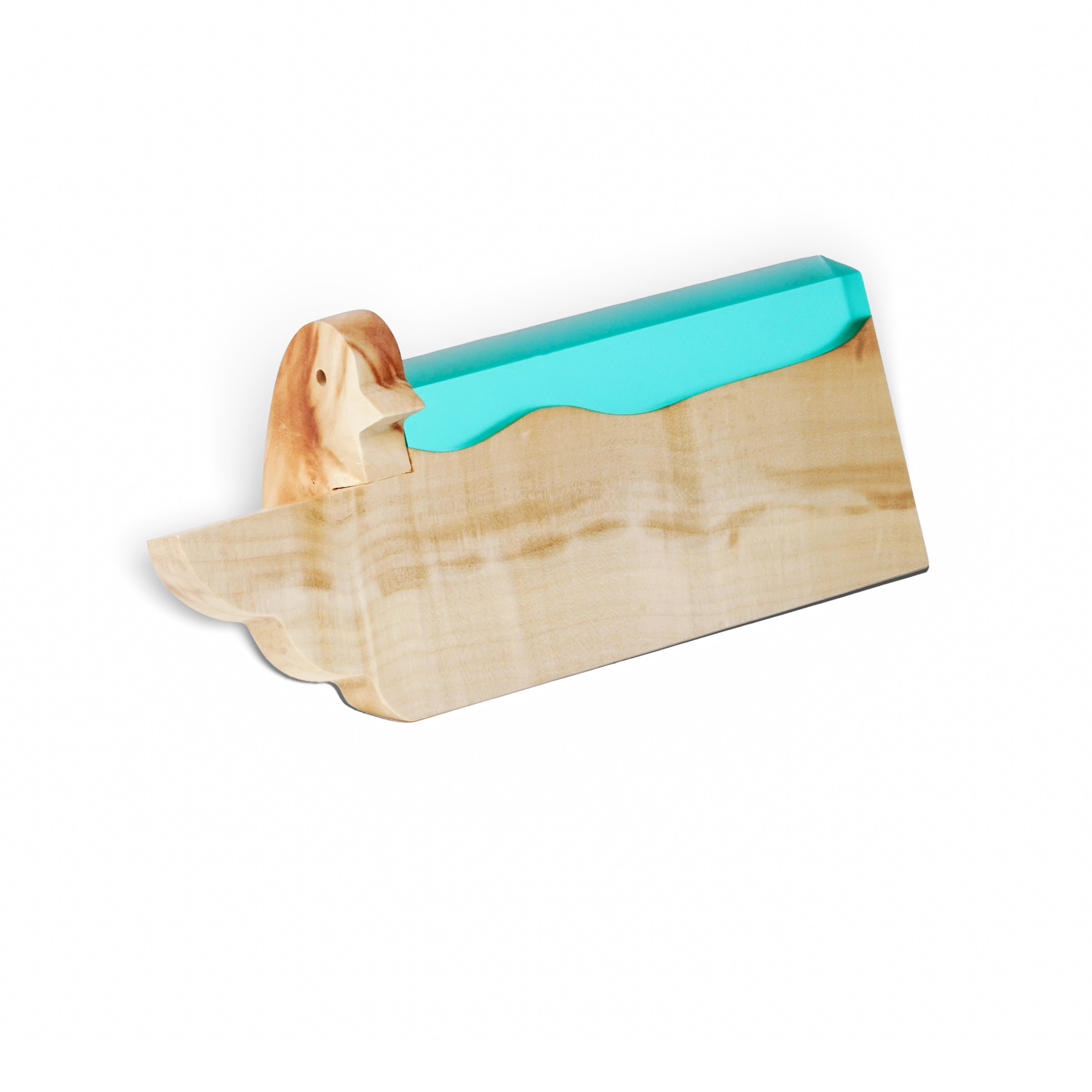 Rear view of the personalized BIRDY desk name plate handcrafted from maple wood and aqua blue epoxy resin