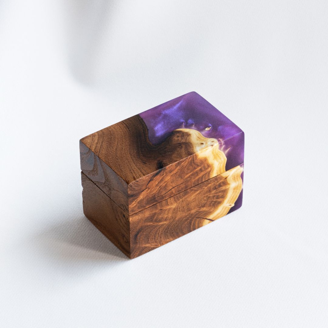 Closed engagement ring box crafted from purple epoxy and natural elm wood, CHORD design