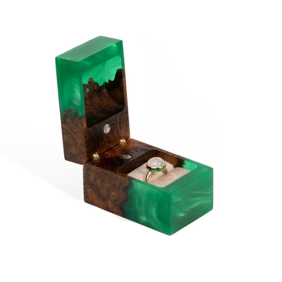 Elegant open green epoxy and elm wood proposal ring box with the ring holder visible