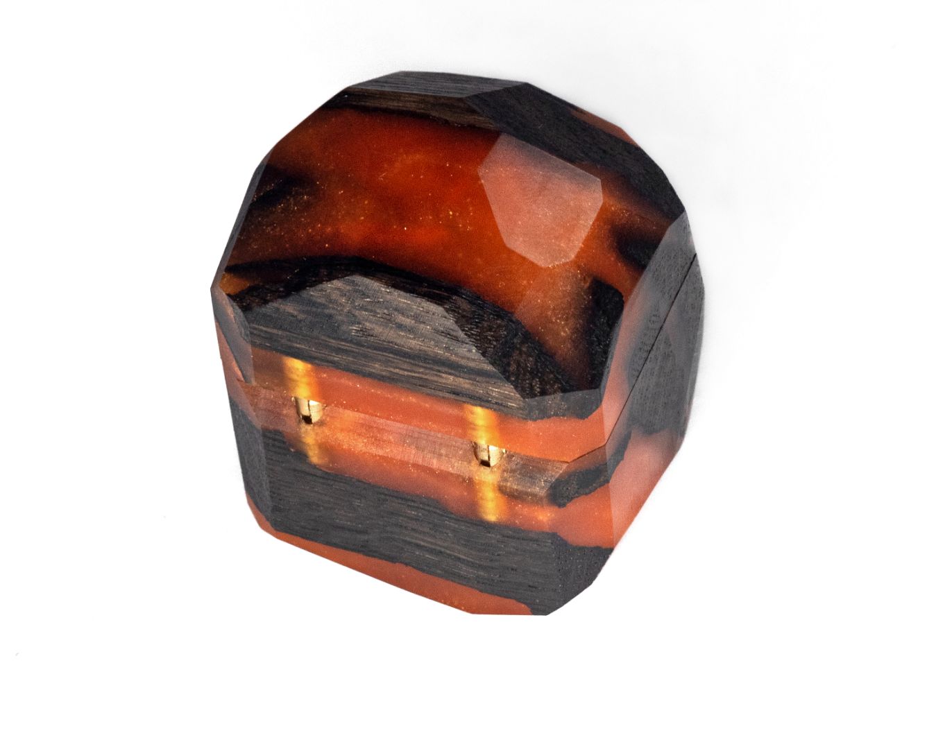 Closed amber epoxy and bog oak wood proposal ring box highlighting its geometric faceted exterior