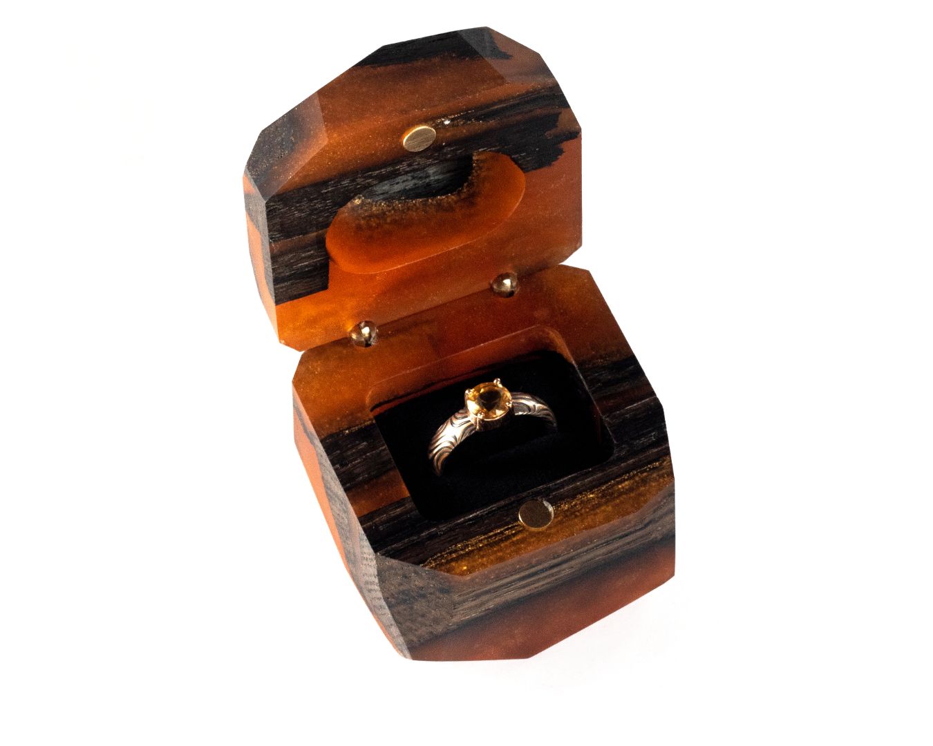 Front view of the open amber epoxy and bog oak wood proposal ring box with the black ring holder visible