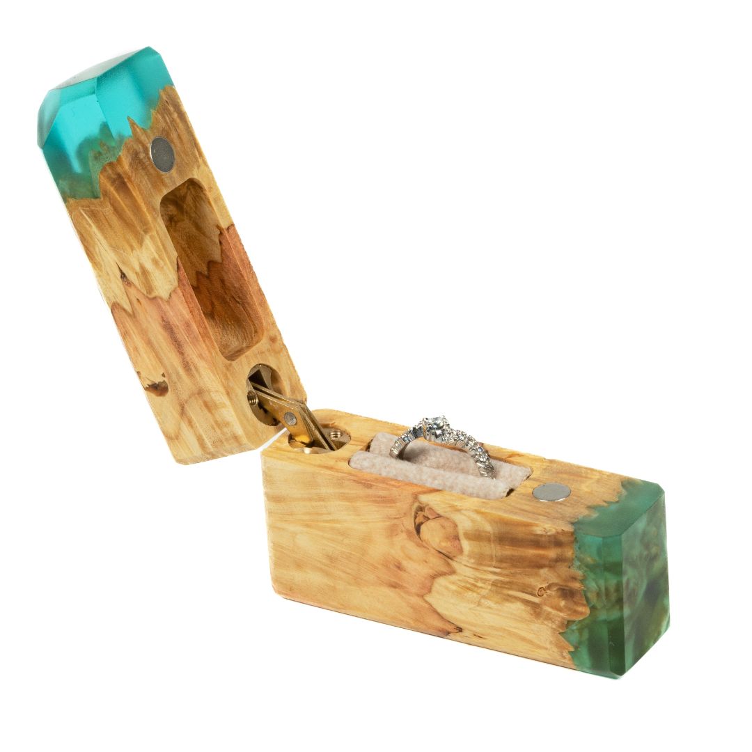Modern proposal ring box featuring aqua blue epoxy and maple wood shown from multiple angles