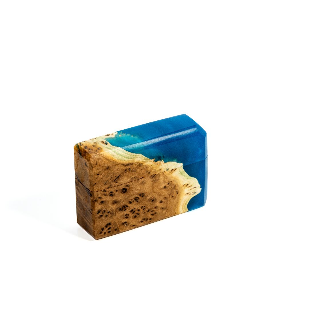Close-up of the blue epoxy and natural elm wood grain on the FLASH proposal ring box