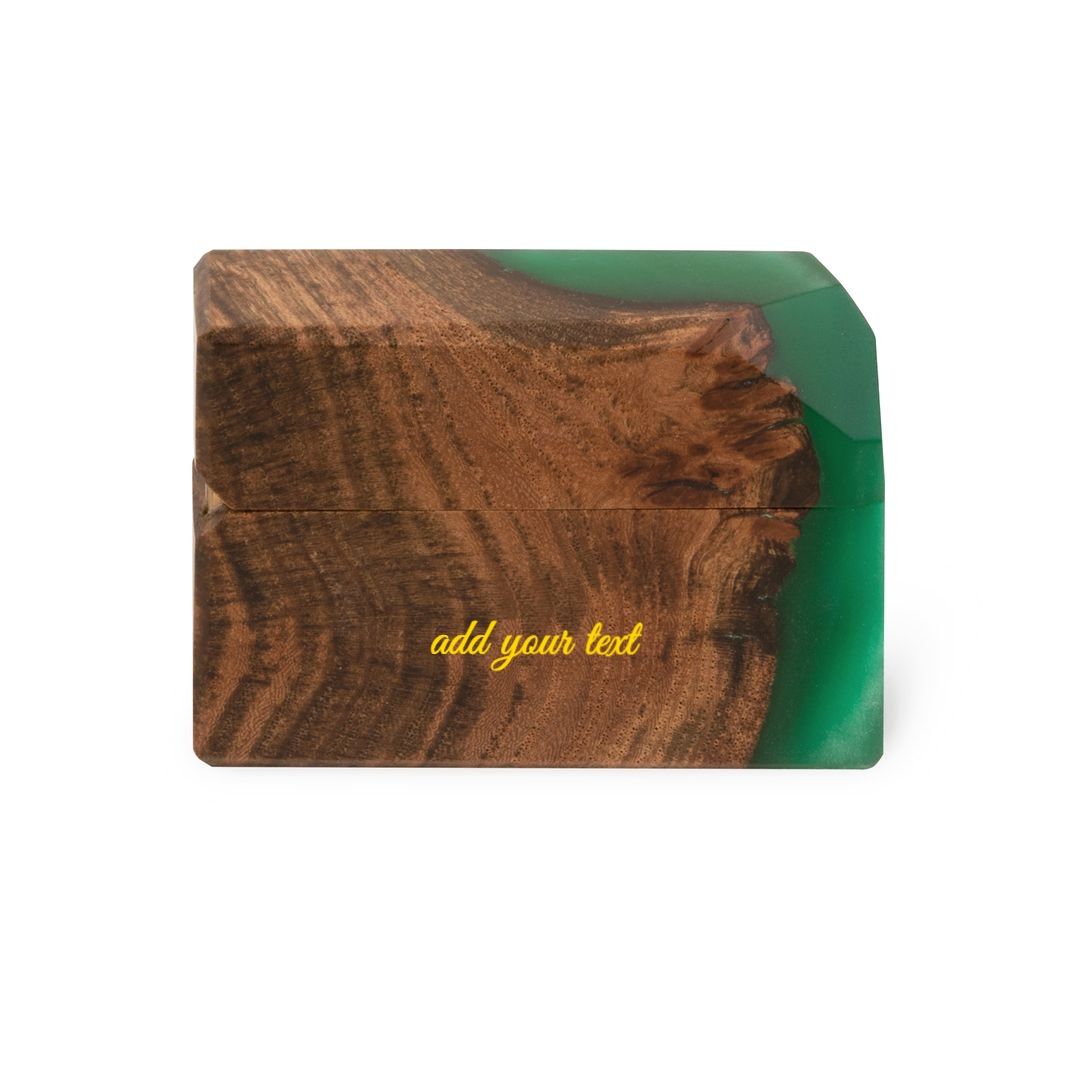 Close-up of the natural elm wood grain and green epoxy on the FLASH proposal ring box