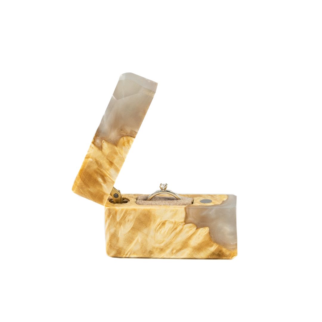 Premium open platinum epoxy and maple wood engagement ring box highlighting the ring compartment