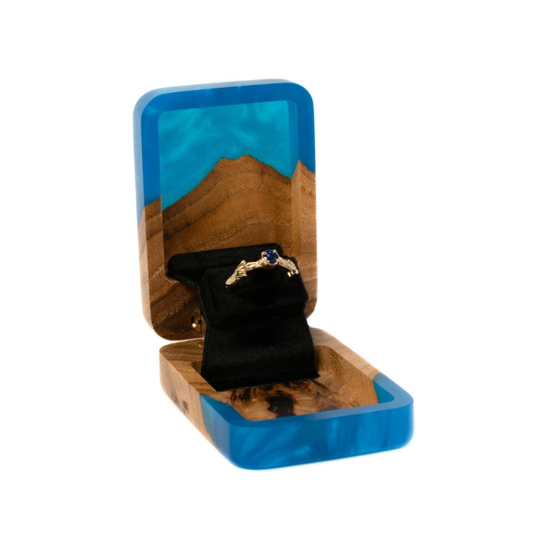 Premium open blue epoxy and elm wood proposal ring box with ring compartment visible