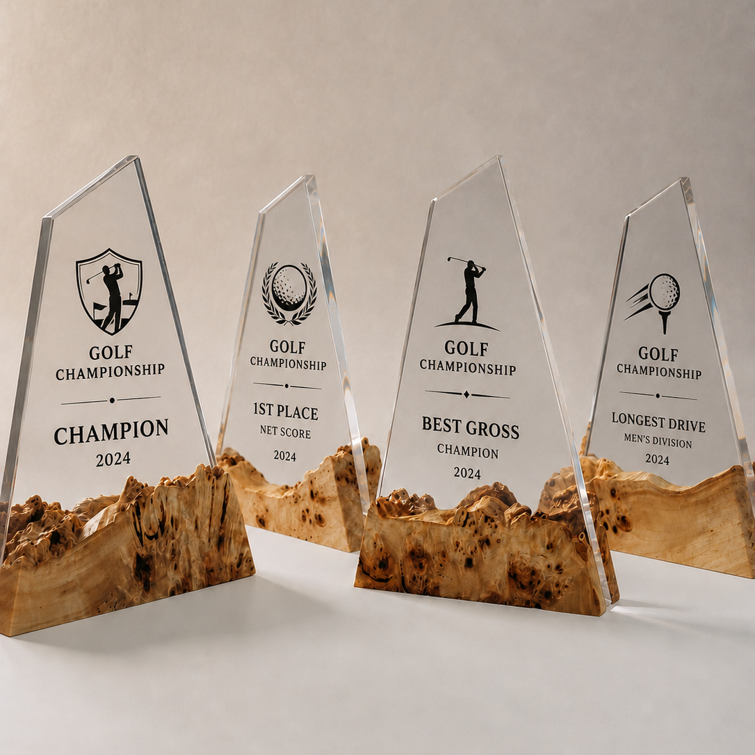 Four clear epoxy award plaques for a golf tournament: champion, 1st place, best gross and longest drive
