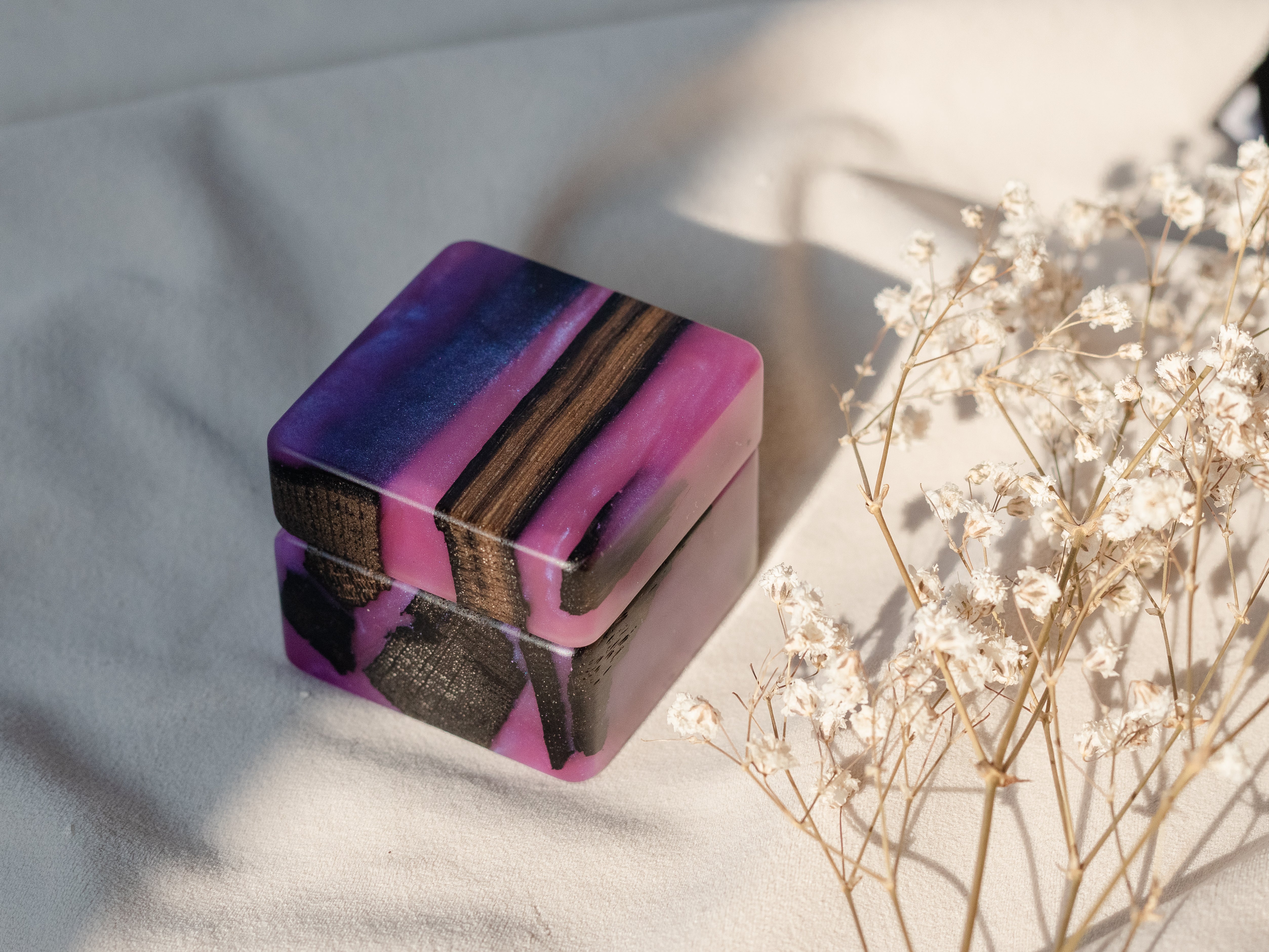Closed handcrafted proposal ring box made from purple epoxy and bog oak wood
