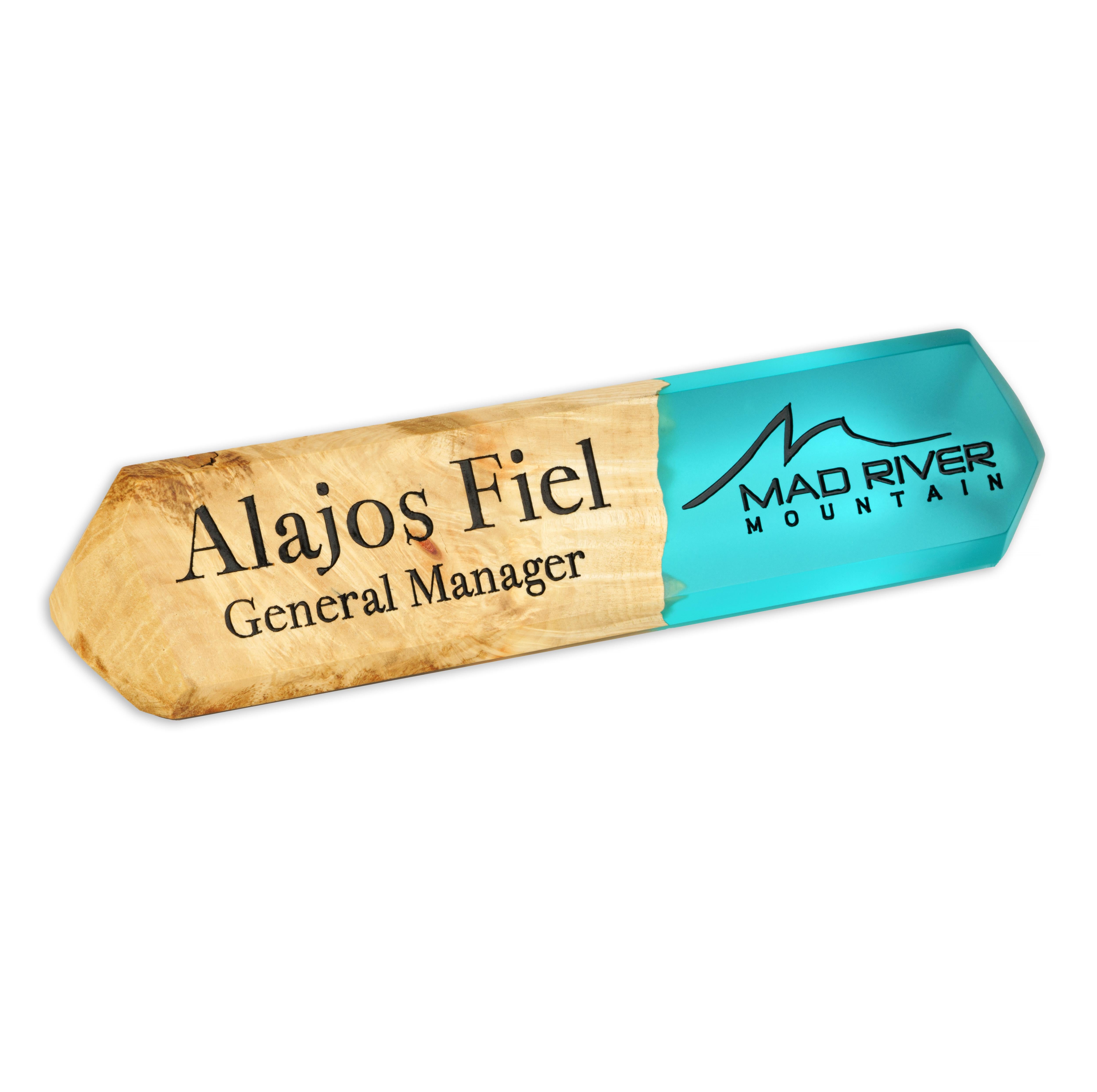 Close-up of the personalized desk name plate handcrafted from maple wood and aqua blue epoxy resin