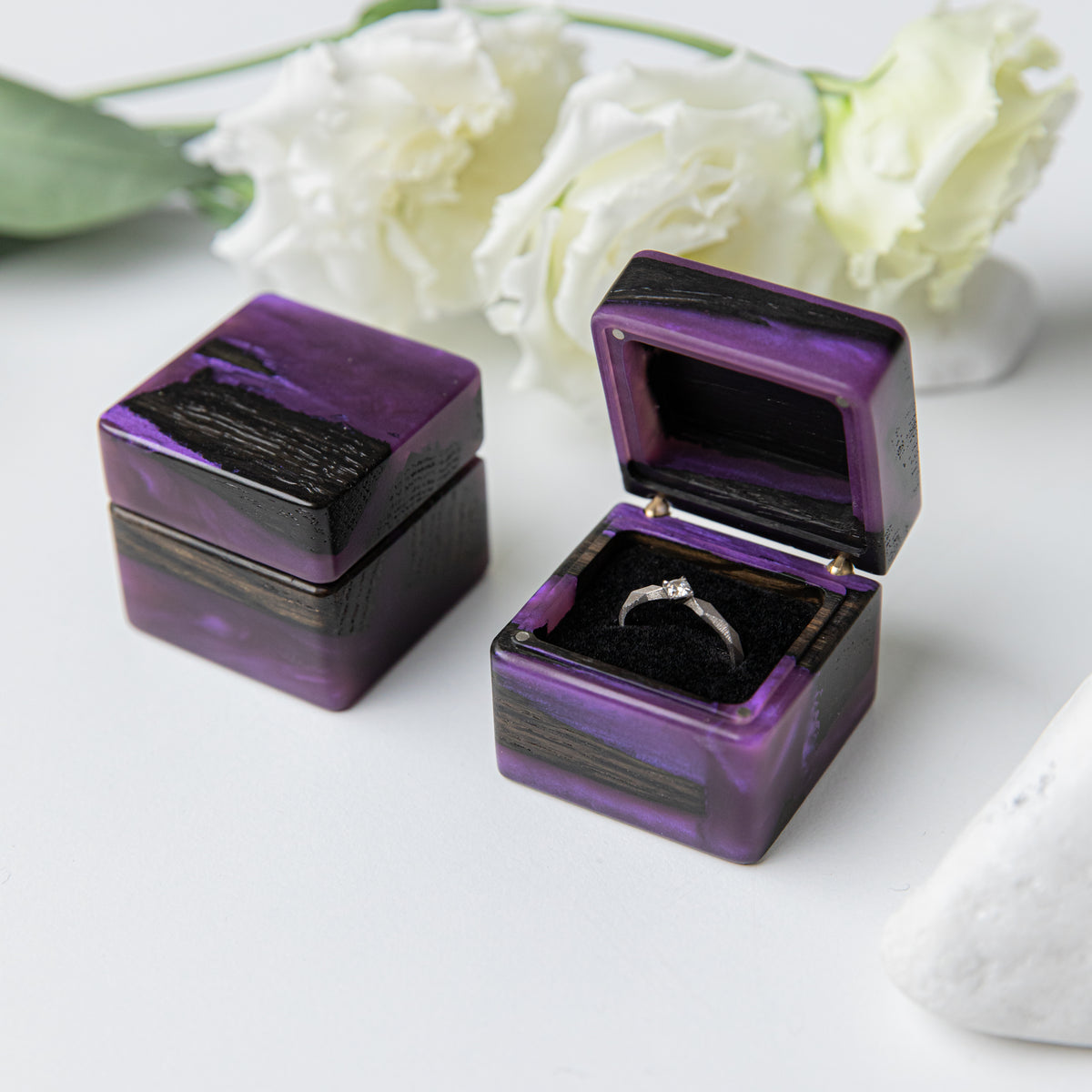 Proposal ring box in purple epoxy and bog oak, shown closed and open with a ring inside