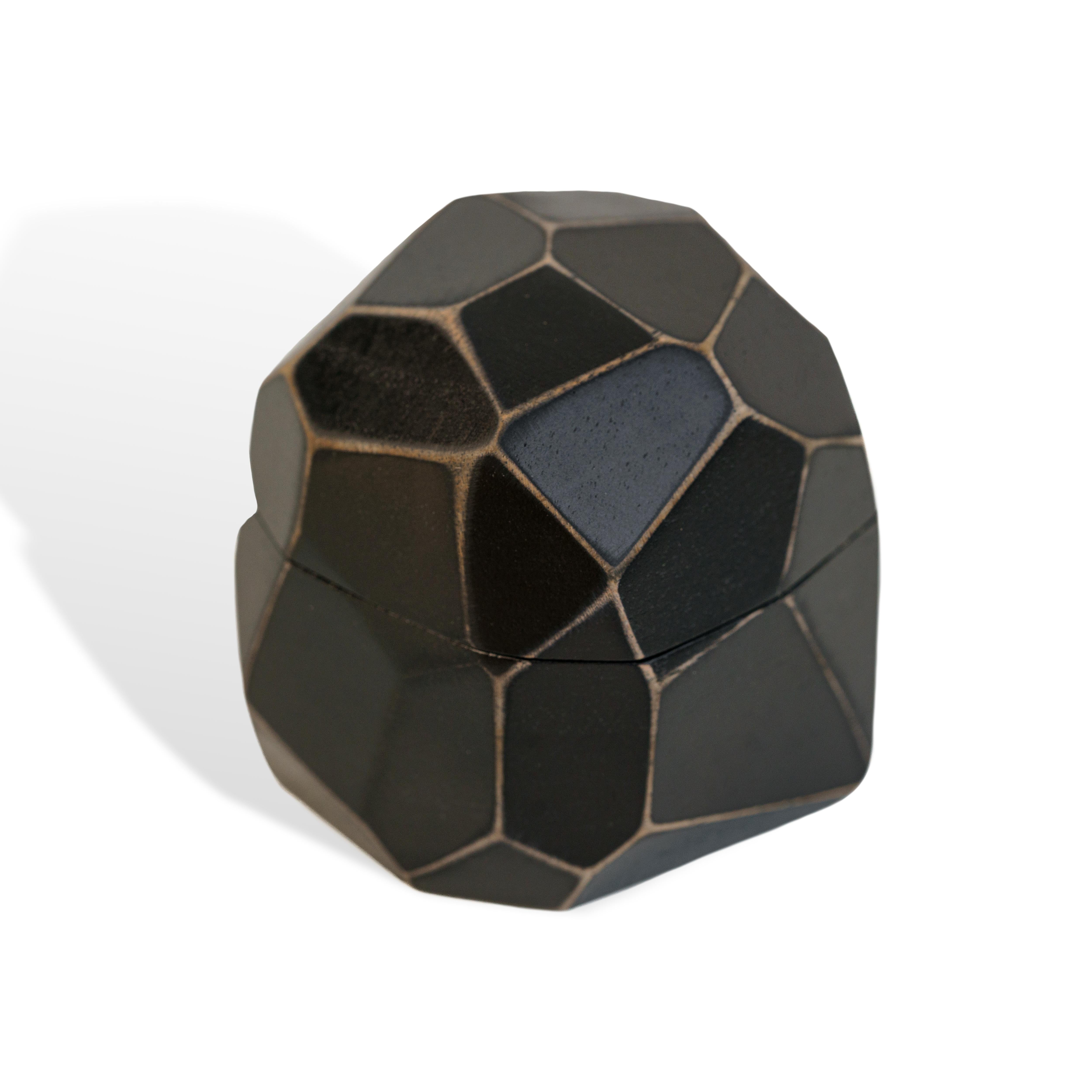 Faceted black epoxy and bog oak wood proposal ring box viewed from an angled perspective
