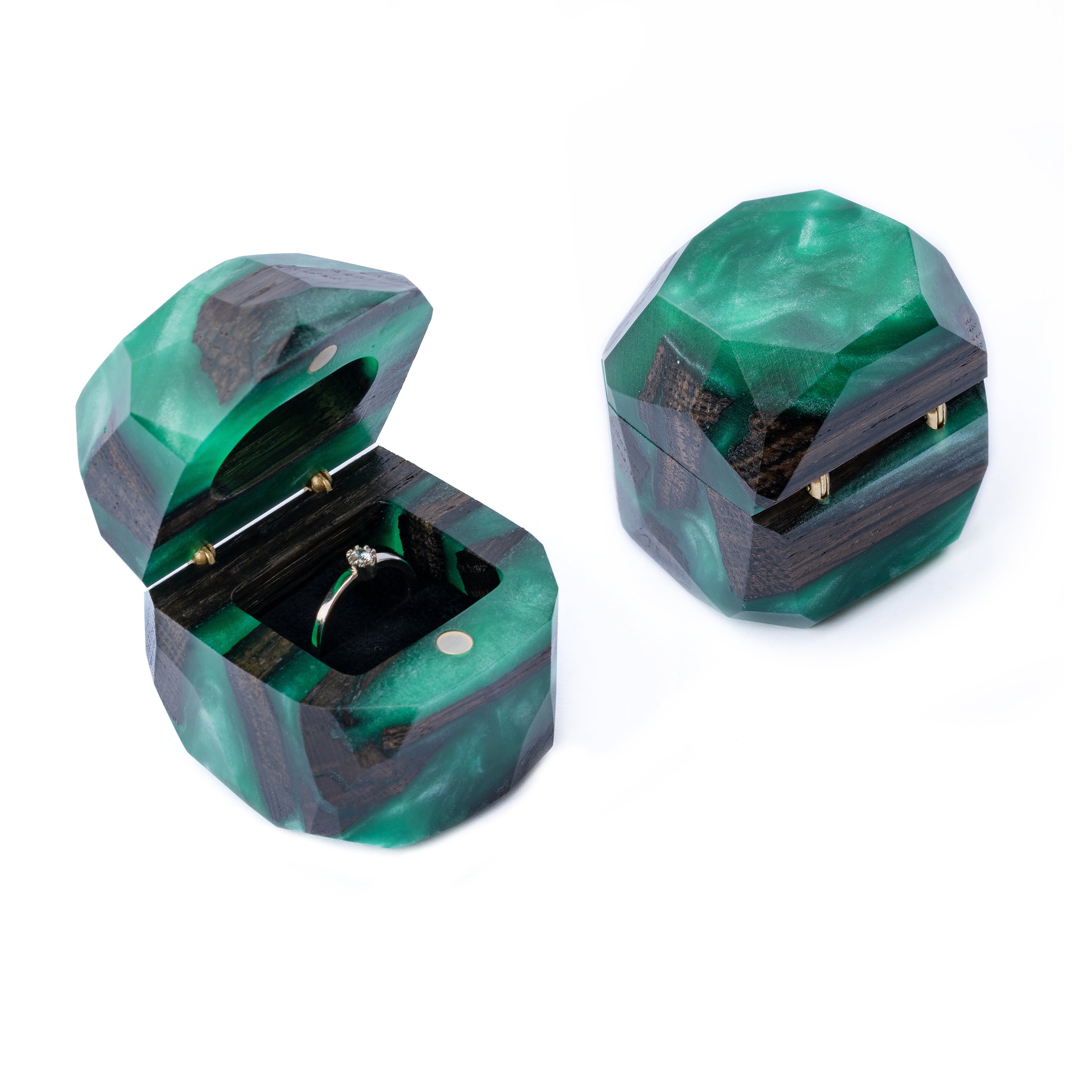 Open and closed green epoxy and bog oak wood engagement ring boxes displayed side by side