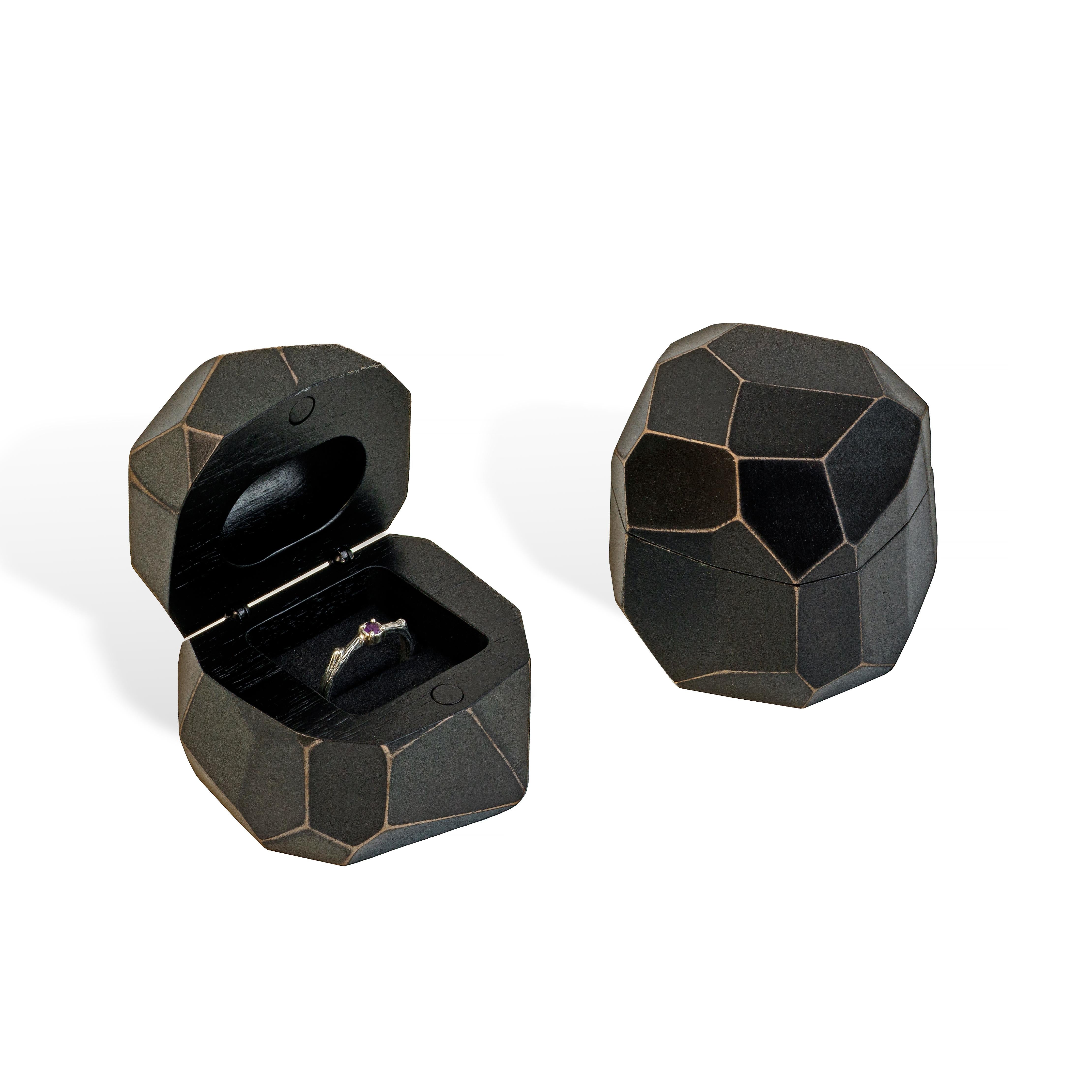 Open and closed black epoxy and bog oak wood proposal ring boxes displayed together