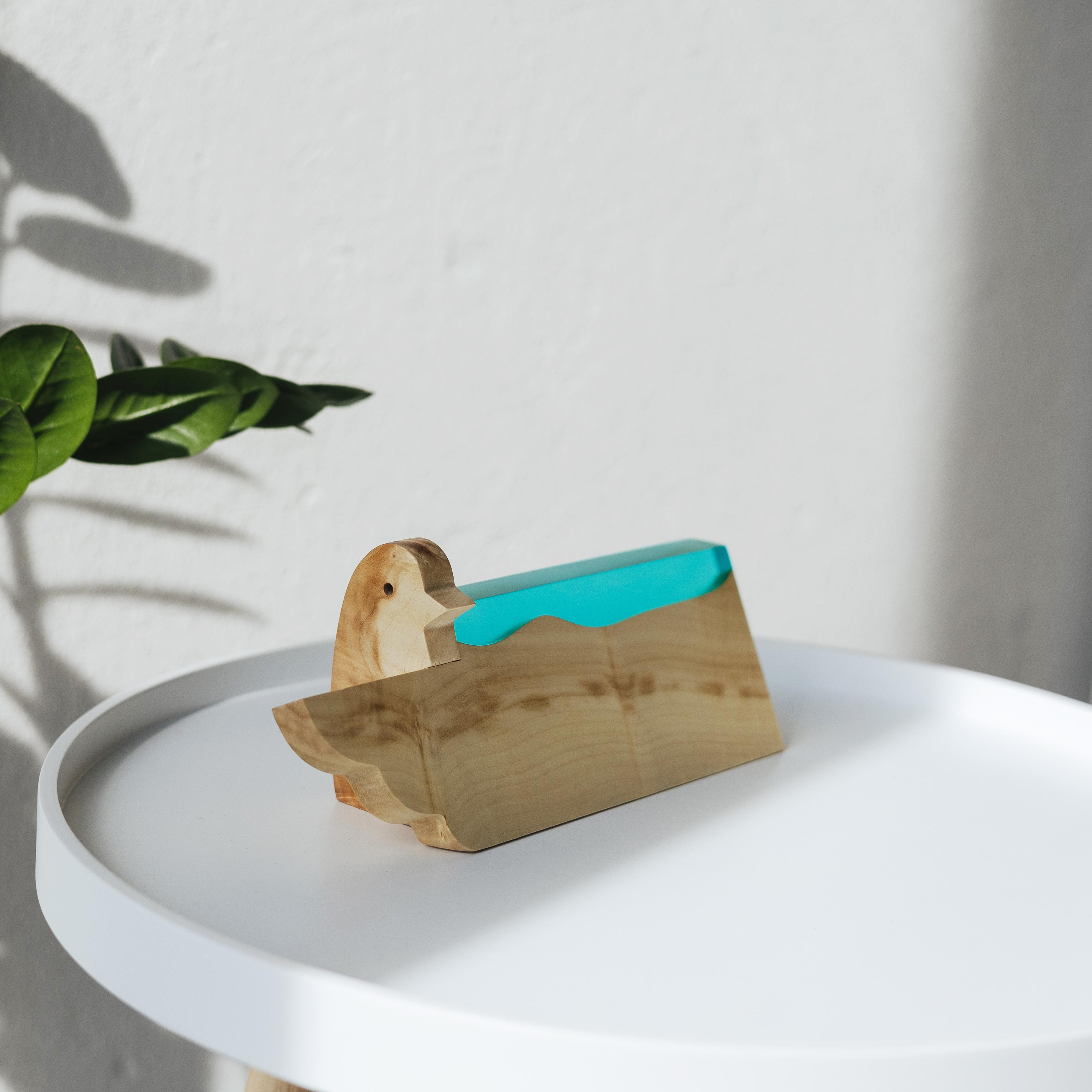 Front view of the personalized BIRDY desk name plate made from maple wood and aqua blue epoxy resin