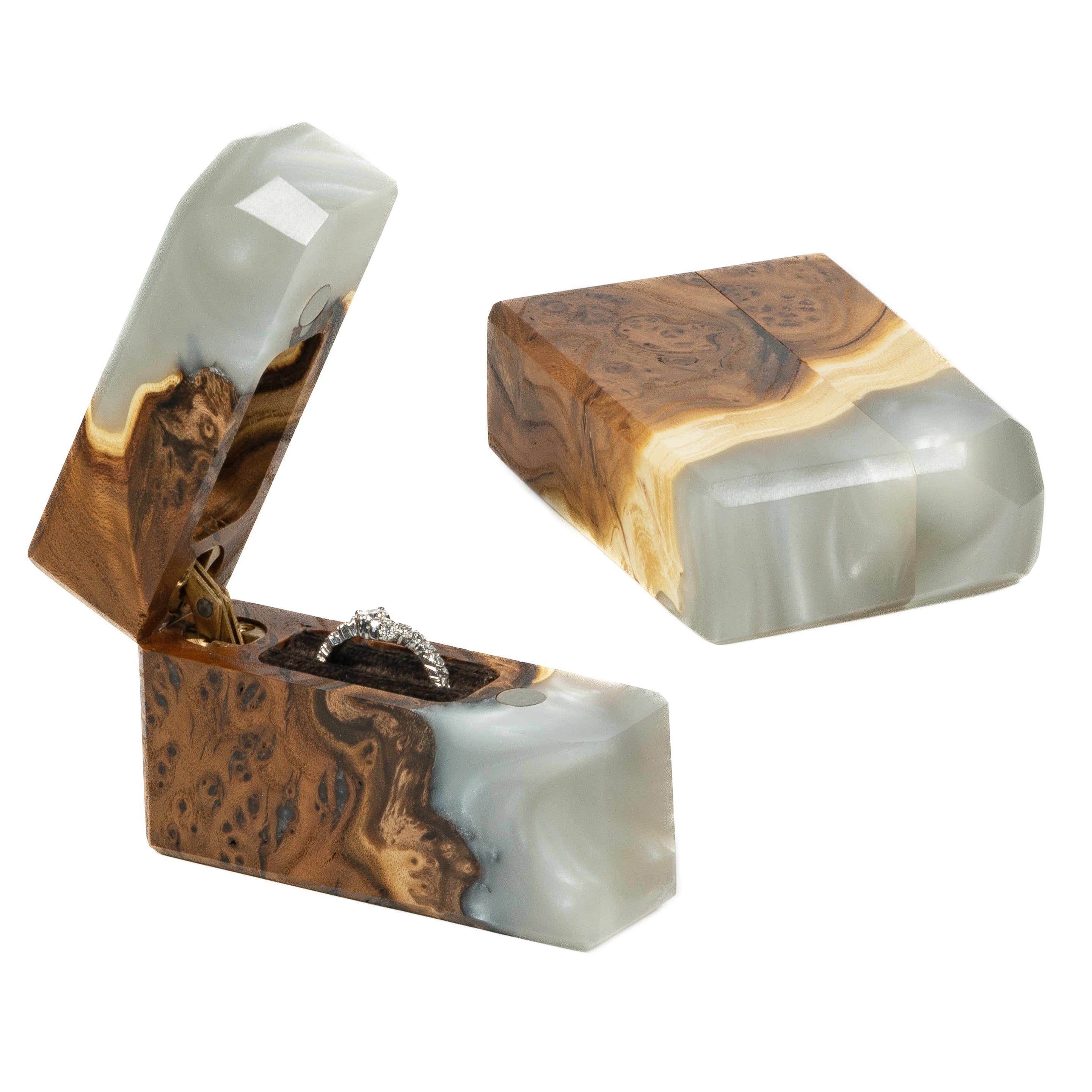 Premium platinum epoxy and elm wood engagement ring box photographed from an angled front view