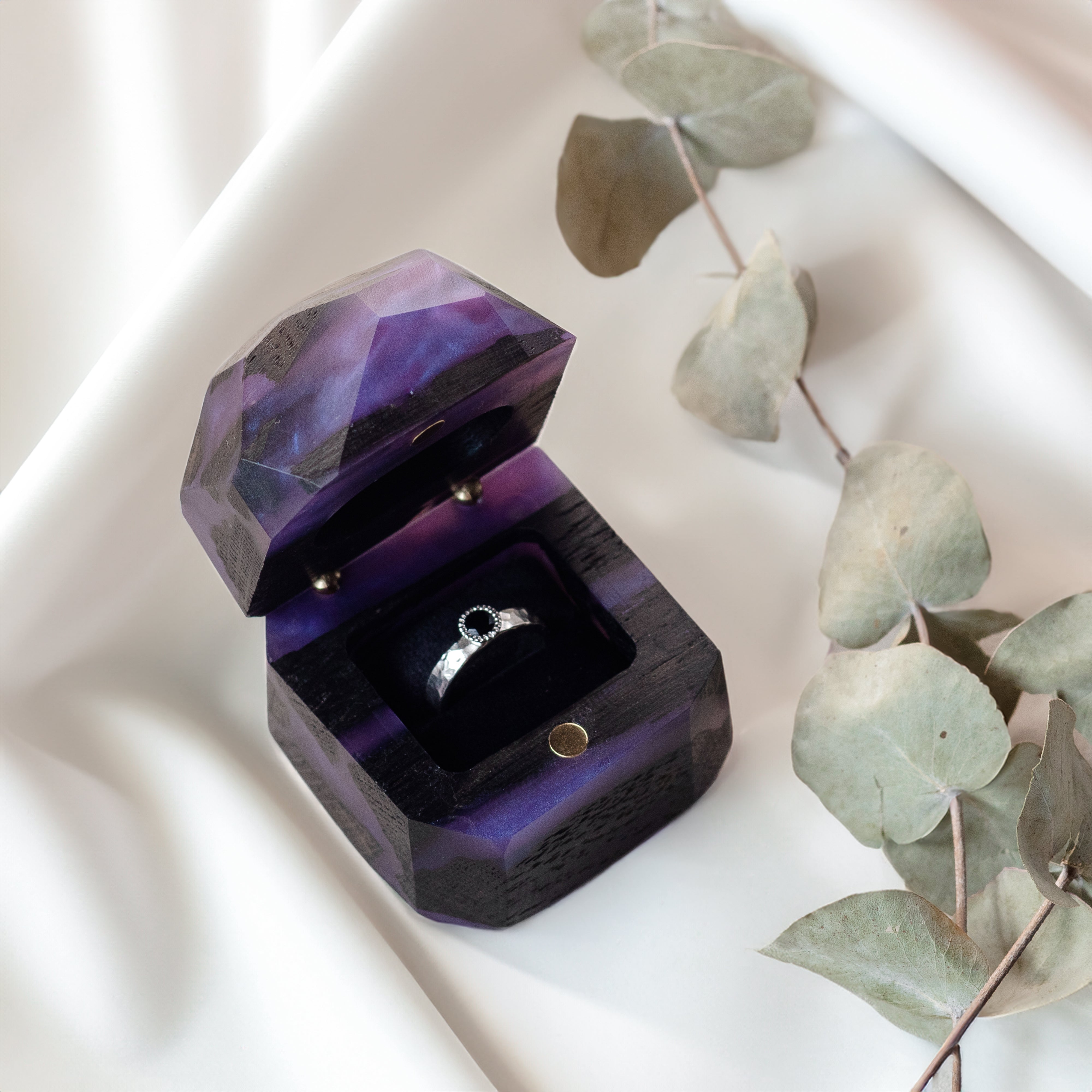 Purple epoxy and bog oak proposal ring box with open lid showing the ring compartment, METEORITE design