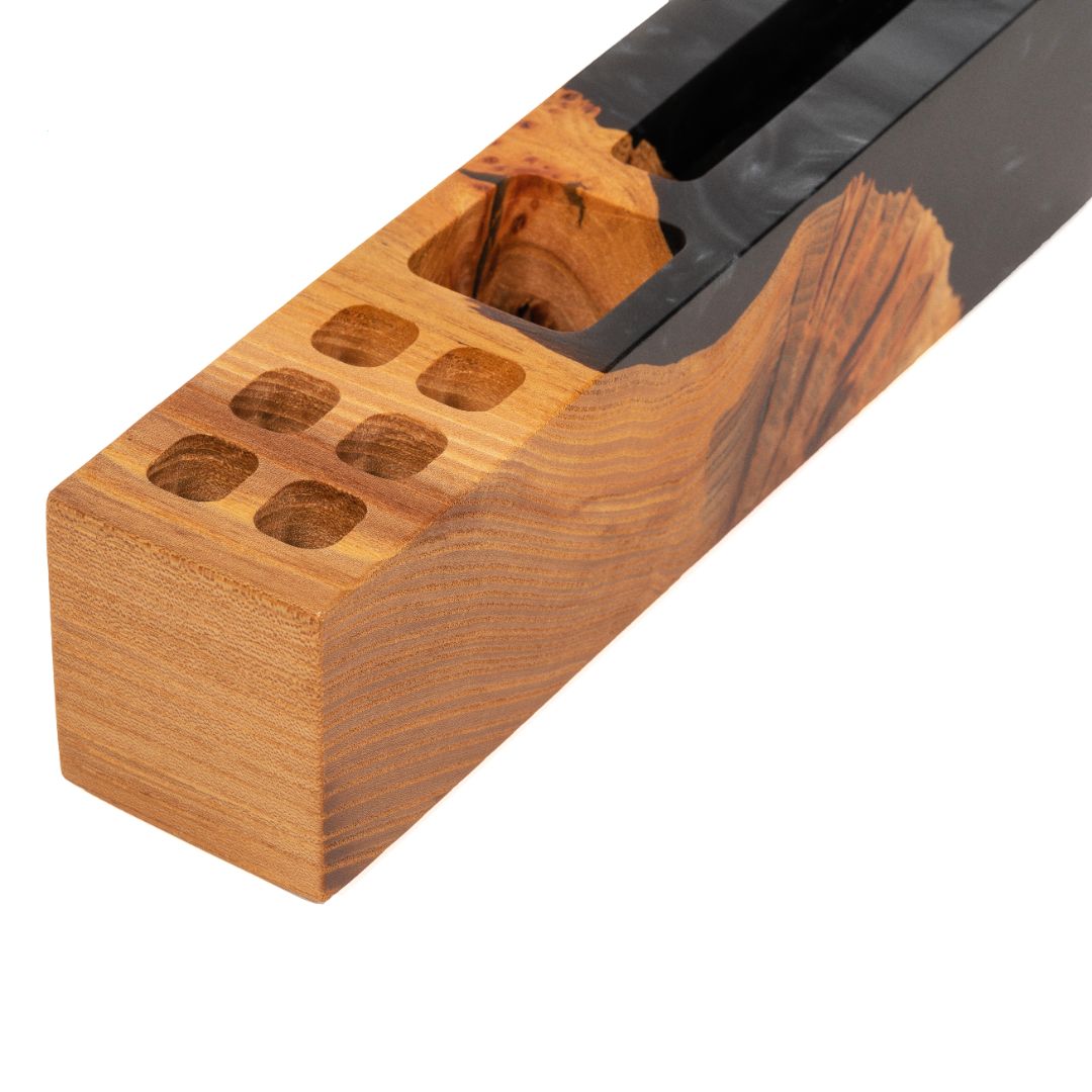 Detail view of the ELEMENT wood desk organizer handcrafted from elm wood and black epoxy resin