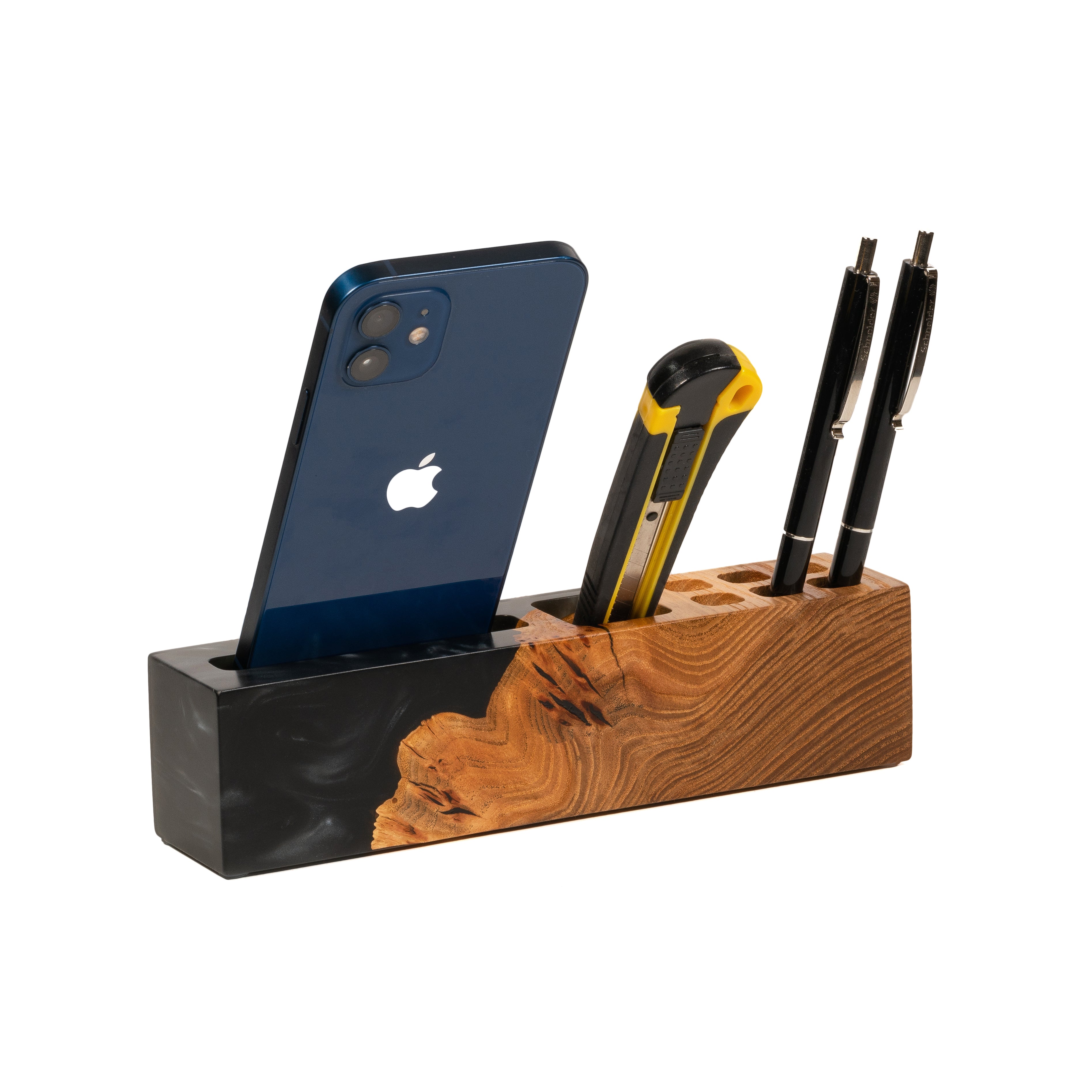 Lifestyle view of the ELEMENT wood desk organizer with phone stand and pen holder made from elm wood and black epoxy resin
