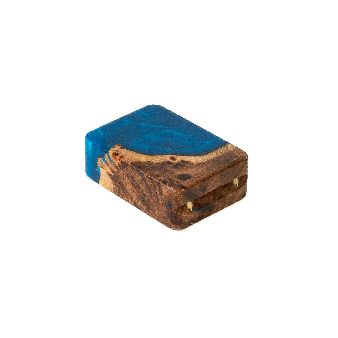Compact closed proposal ring box featuring blue epoxy and natural elm wood grain