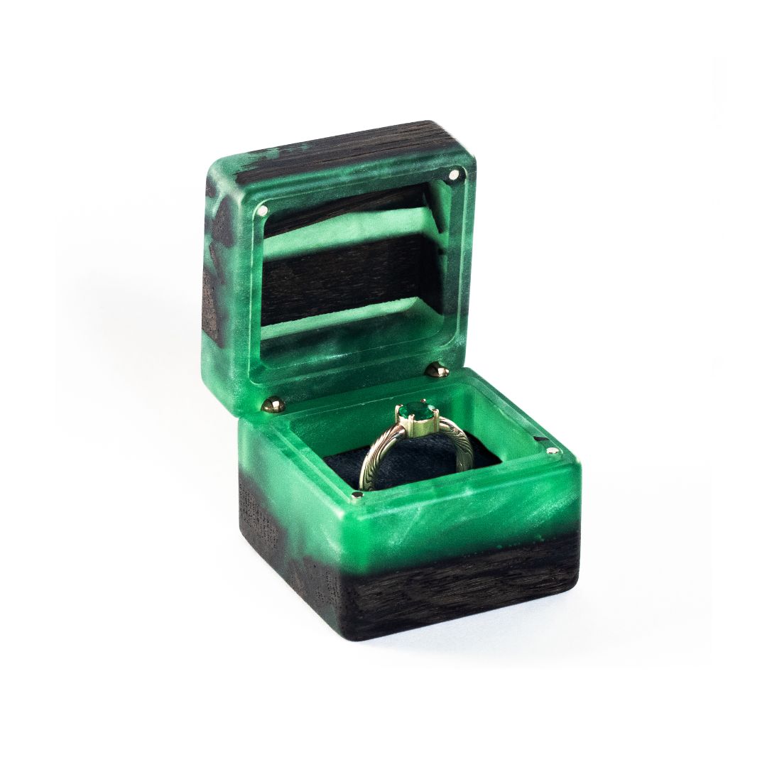 Front view of the open green epoxy and bog oak wood engagement ring box