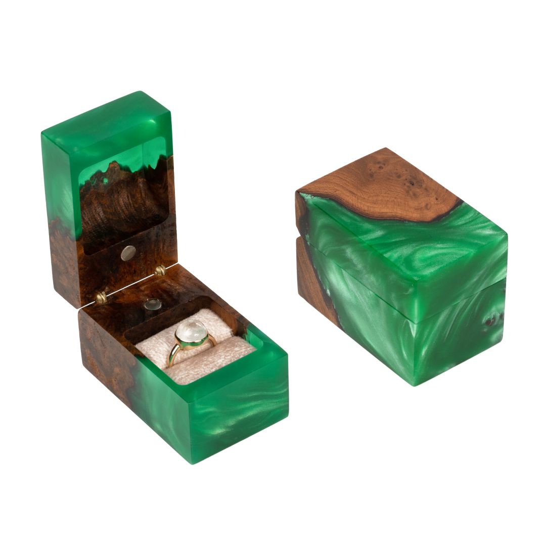 Open and closed green epoxy and elm wood proposal ring boxes displayed together